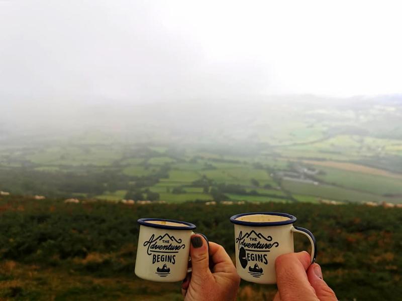 Camp mugs in the mist